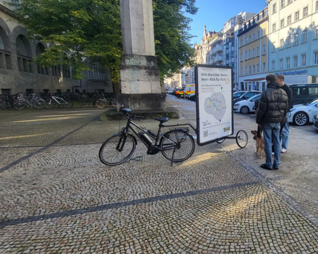 Interested Munich residents take a look at IKEA's bike advertising 