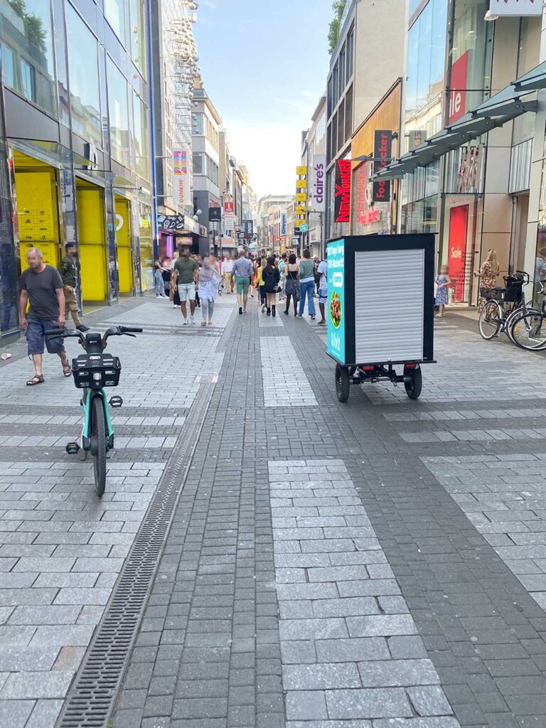 Bike advertising in Schildergasse, the busiest shopping street in Cologne 